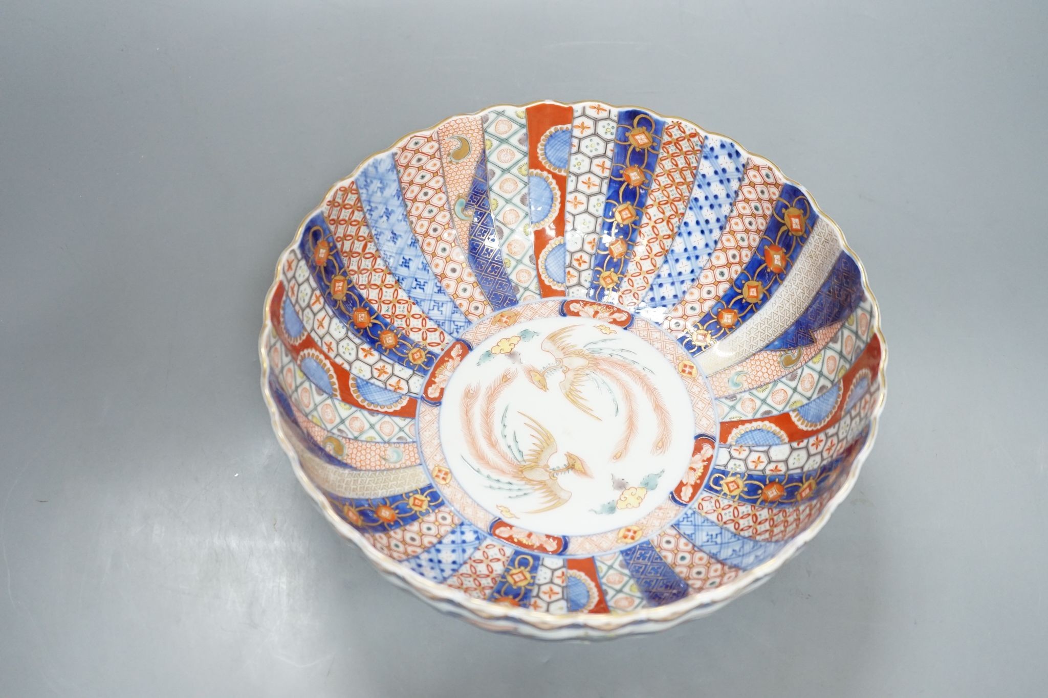 A Japanese Imari petal lobed bowl, by Fukugawa, 25 cms diameter.